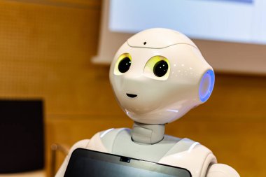 Pepper - the japanese semi humanoid robot assistant closeup, portrait . Artificial intelligence, modern human like robotics concept, camera, screen clipart