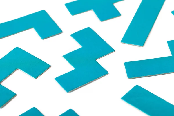 Különböző Formák Kék Puzzle Elemek Minta Fehér Háttér Elvont Szétszórt — Stock Fotó