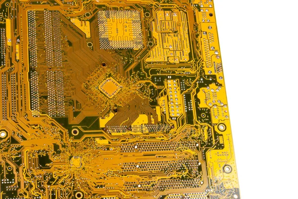 Huge green yellow complex advanced electrical circuit board background texture macro, closeup. Hi tech, technology wallpaper backdrop pattern, copy space isolated, back of the motherboard concept shot