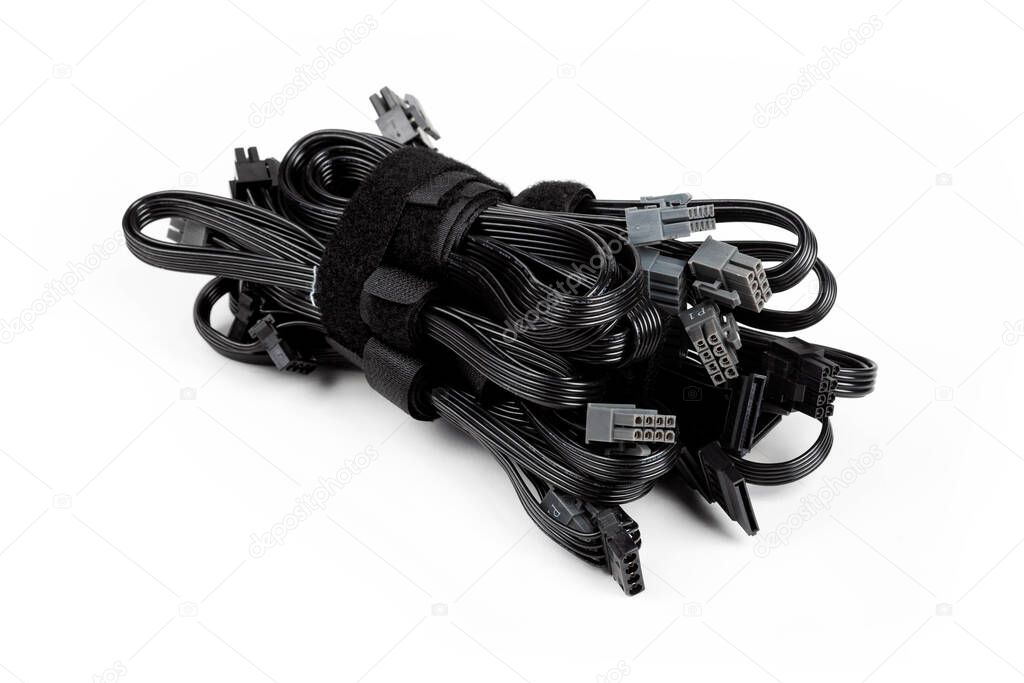 Black modular power supply unit cables set, psu cords put together isolated on white. Many power cables, modern pc assembly parts. Cable management concept, product photo