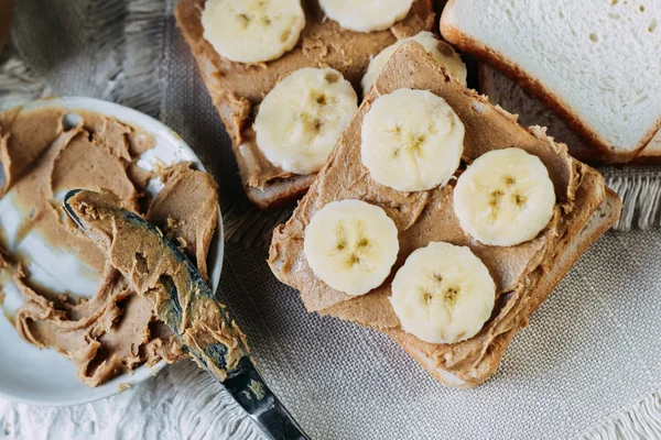 sandwich with peanut butter and bananas. Healthy and tasty breakfast or snack.