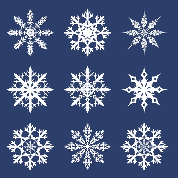 Illustration vectorielle d'un ensemble de flocons de neige du Nouvel An — Image vectorielle