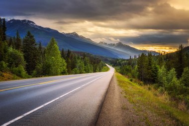 Scenic Icefields Pkwy in Banff National Park at sunset clipart