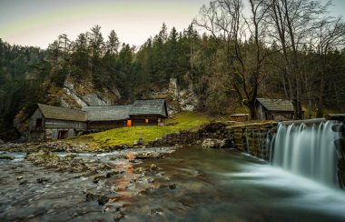 Old wooden water mill at National Nature Reserve Kvacianska dolina in Slovakia clipart