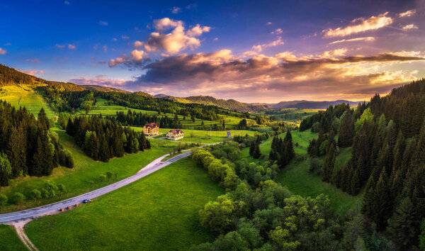 Aerial view of countryside around the village of Telgart in Slovakia at sunset.
