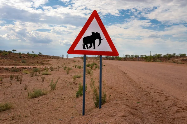 Elephant crossing warning road sign placed in the desert of Namibia — Stock Photo, Image