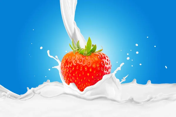 Strawberry in milk splash — Stock Photo, Image