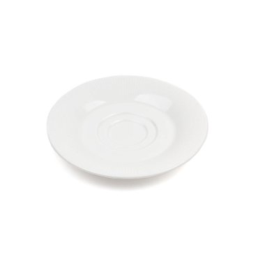 Beyaz zemin üzerinde beyaz seramik plaka.