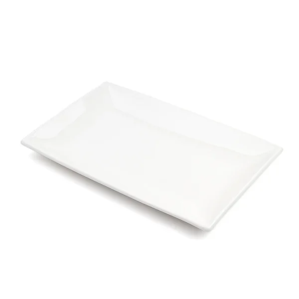 Beyaz zemin üzerinde beyaz seramik plaka.