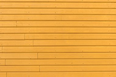 Sarı tahta duvar. Yatay çizgiler.