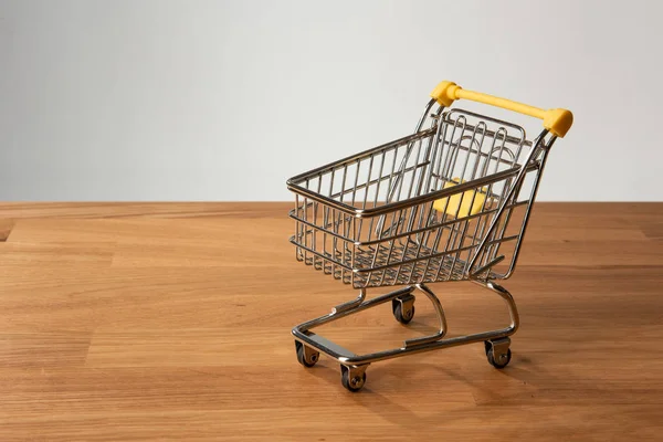 Empty Shopping Cart Wooden Floor — Stock Photo, Image