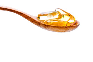 Jel kapsül omega 3 kaşık. Kapsül balık yağı kapatın 
