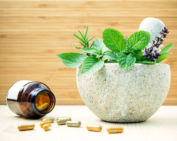 Alternative health care and herbal medicine .Fresh herbs and her