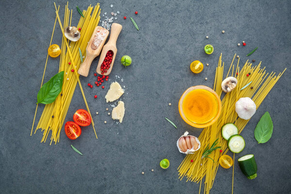 Italian food concept. Spaghetti with ingredients sweet basil ,to