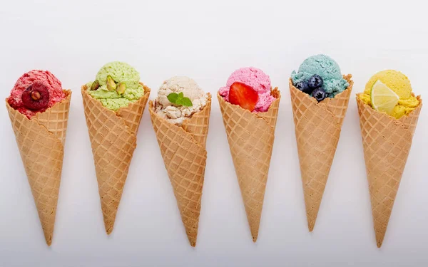 Various Ice Cream Flavor Cones Blueberry Strawberry Pistachio Almond Orange — Stock Photo, Image