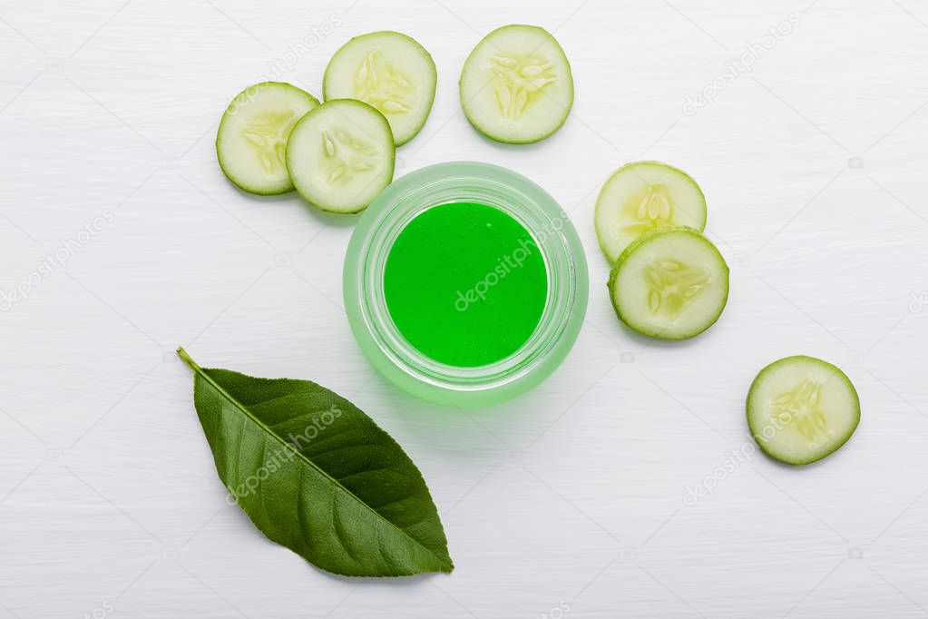Natural herbal skin care products. Top view ingredients cucumber and aloe vera on table concept of the best all natural face moisturizer. Facial treatment preparation background.