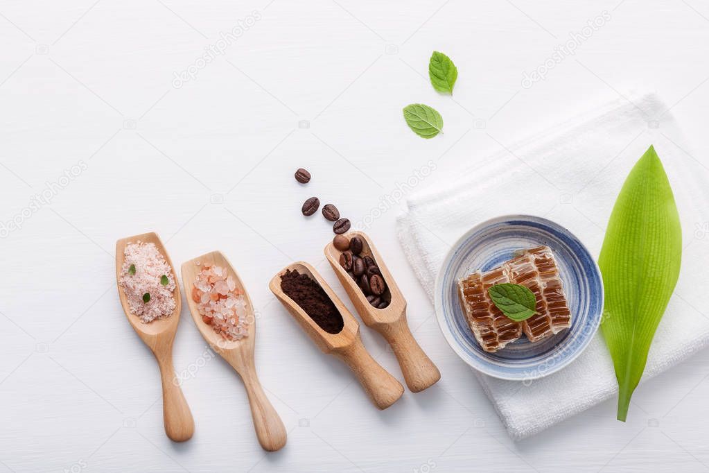 Natural herbal skin care products. Top view ingredients coffee power ,honeycomb and himalayan salt on table concept natural face moisturizer. Facial treatment preparation background.