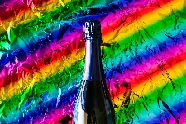 Bouteille de champagne arc-en-ciel fond . — Photo