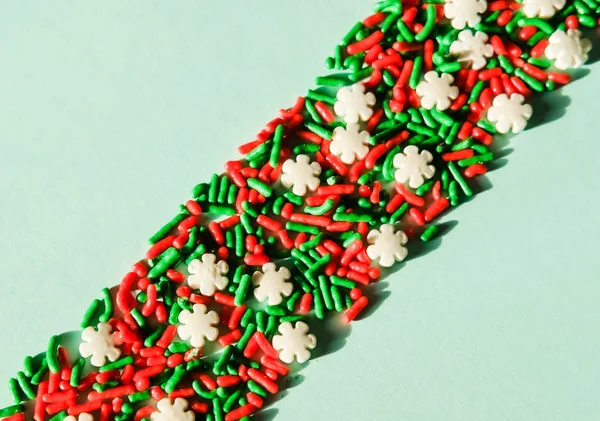 Christmas sugar sprinkles background. — Stock Photo, Image