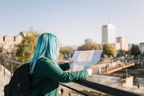 Back of tourist woman on vacation searching for direction — 스톡 사진