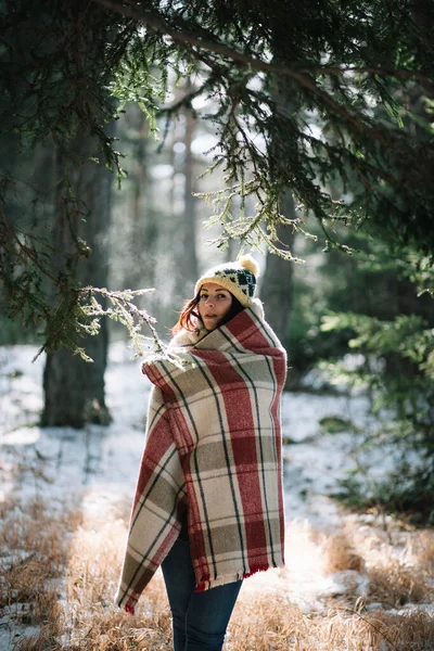 Freezing girl warming herself with blanket in cold day — 스톡 사진