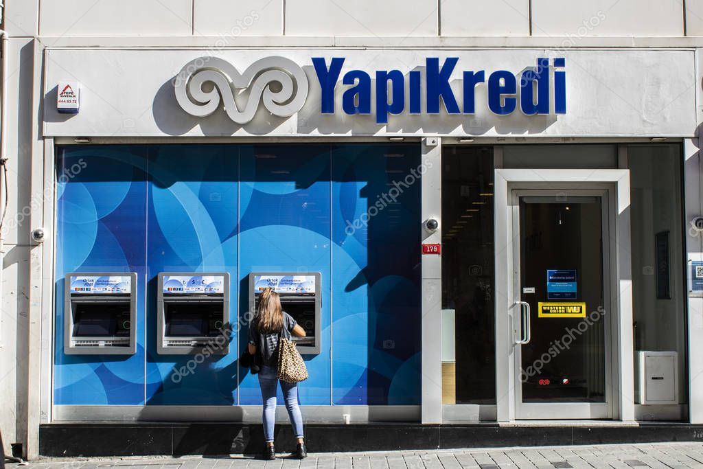 Istanbul, Turkey - October-10.2019: Yapi Kredi bank branch and ATM on the left are shown.