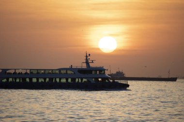 Kadikoy Moda coast sea view at sunset. Photographed outdoors. Golden hour