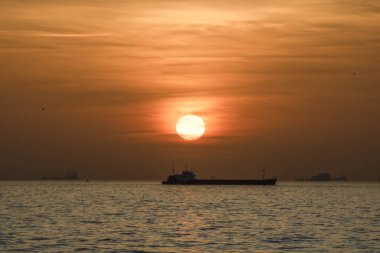 Kadikoy Moda coast sea view at sunset. Photographed outdoors. Golden hour