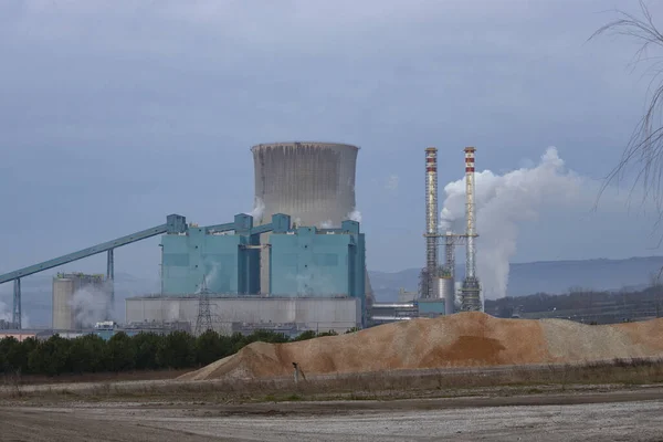 Coal-fired thermal power plant. There is no smoke in the chimney. The other thermal power plant is running in the background. Canakkale, Turkey