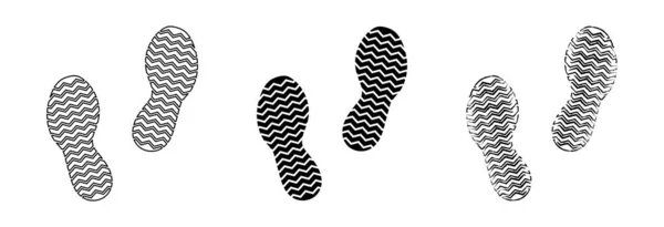 平面線形設計 人間の足跡が違う 白を基調とした黒のシルエット ベクターイラスト — ストックベクタ