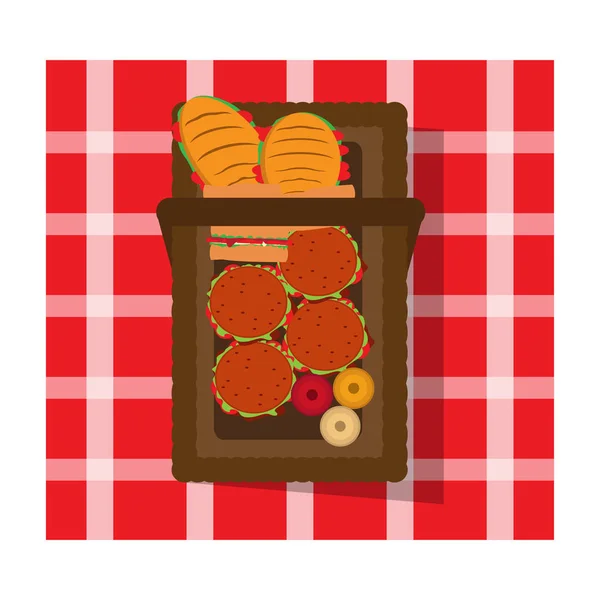 Cesta de picnic y mantel — Vector de stock