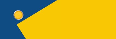 Sarı boya kavanozlu iki renkli arka plan.