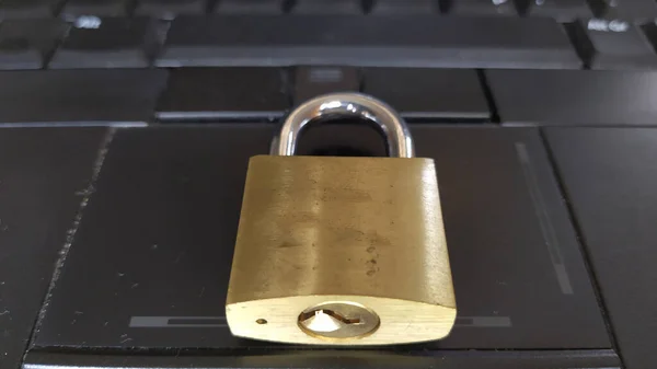 Padlock on laptop. Internet data privacy information security concept. Antivirus and malware defense.
