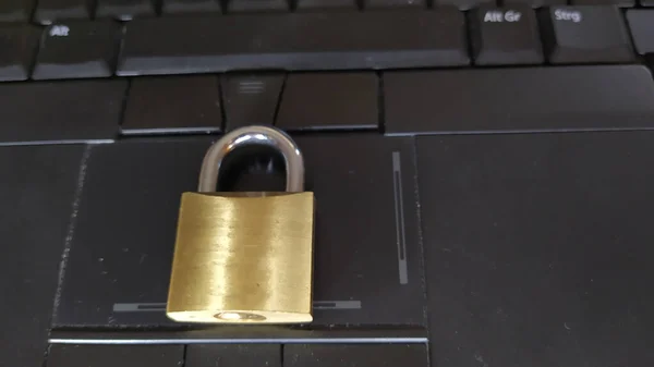 Padlock on laptop. Internet data privacy information security concept. Antivirus and malware defense.