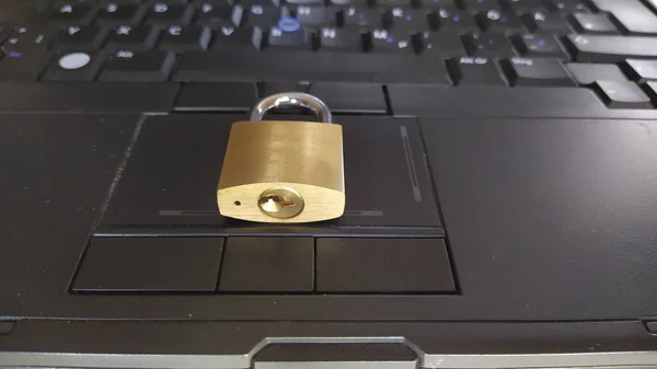 Padlock on laptop. Internet data privacy information security concept. Antivirus and malware defense.