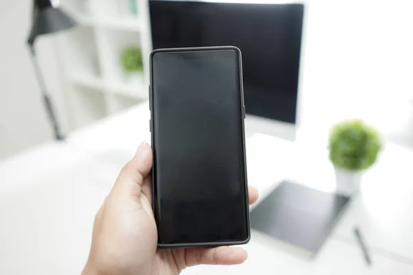 Close Hand Holding Phone Work Table Mockup Smartphone Blank Screen — Stockfoto