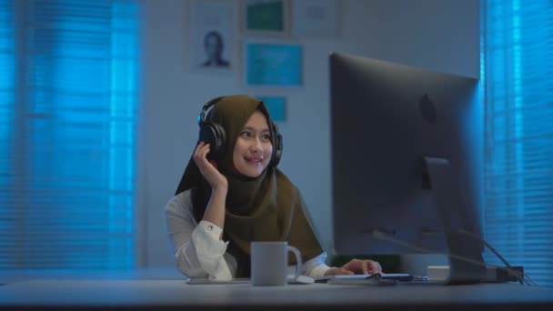 Sleepy Asian Muslims Wearing Dark Headscarves Drinking Coffee Working Home — Stock Video