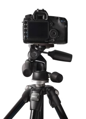 Beyaz arka plan üzerinde izole tripod Dslr kamera görüntüsünü