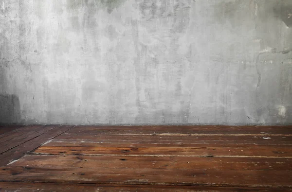 Gambar latar belakang dinding beton abu-abu dan lantai kayu tua — Stok Foto