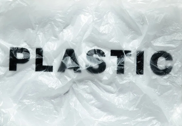Чорне Пластикове Слово Прозорому Білому Одноразовому Поліетиленовому Пакеті Проблема Забруднення — стокове фото