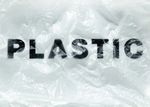 Siyah Plastik Kelime Saydam Beyaz Plastik Torba Üzerinde Kopya Alanı — Stok fotoğraf