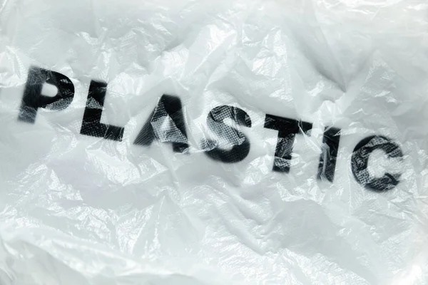 Μαύρη Πλαστική Λέξη Διάφανη Λευκή Πλαστική Σακούλα Μιας Χρήσης Περιβαλλοντική — Φωτογραφία Αρχείου