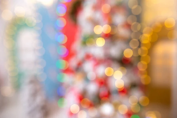 Christmas background with festive bokeh lighting, blurred holiday background — ストック写真