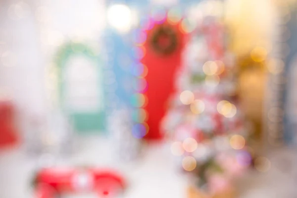 Christmas background with festive bokeh lighting, blurred holiday background — ストック写真