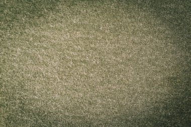 Noel arkaplanı kumaş dokusuyla yeşil, yeni yıl arkaplanı