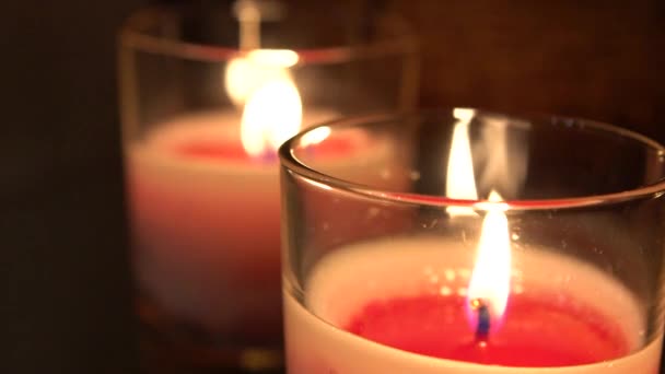 Slow Motion Flame Lighted Red Wax Candle Dark Close Dan — Stock Video