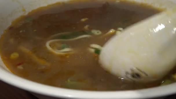 People Eating Bowl Beef Noodles Dinner Asian Restaurant Using Sticks — Stock Video