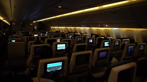 December 2016 Traveling Air Airplane Cabin Passengers Looking Monitors Movies — Stock Video