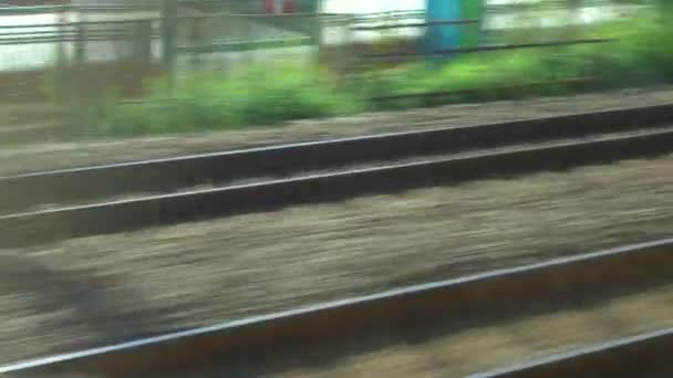 4K Point De Vue Train De Métro De Tokyo Au Japon. Train de métro sur les voies de la ville métropolitaine. Vue des voies ferrées-Dan 