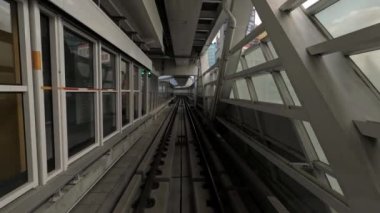 4k, modern sürücüsüz Taipei 'deki POV Journey şehir boyunca uzanan tünel boyunca uzanan Demiryolu Metro Sistemi' ni yükseltti. Demiryolu otomatik tren görüntüsünü pencereden geçirir. Gelişmiş ulaşım - Dan